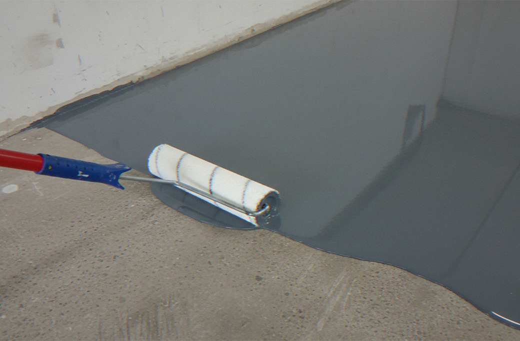 Commercial floor preparation applying an epoxy coating to a mechanical room floor